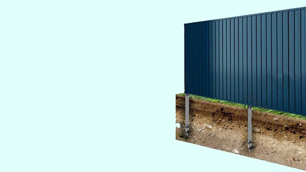Modern stone fence with metal shutters